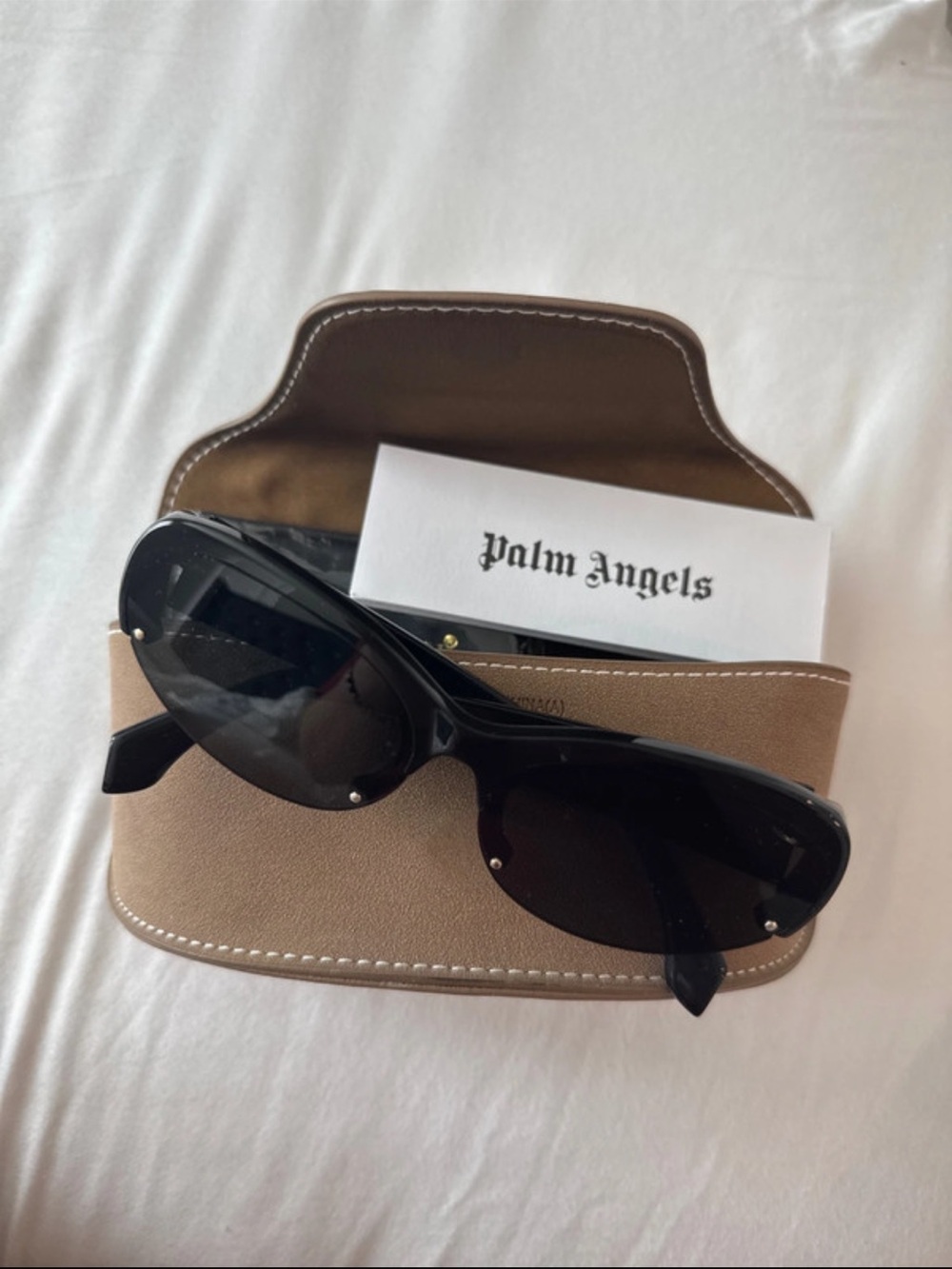 Palm Angels Black Oval Sunglasses with Tan Case